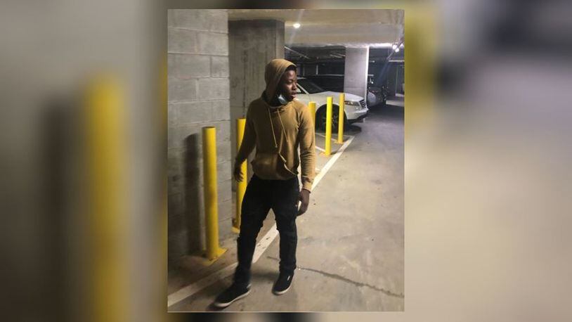 Atlanta police are searching for a man they say fired shots at an off-duty officer who caught him breaking into cars in a parking garage early Saturday.