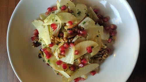 An apple and belgian endive salad is sprinkled with pomegranite seeds. CONTRIBUTED BY: Courtesy Spring restaurant