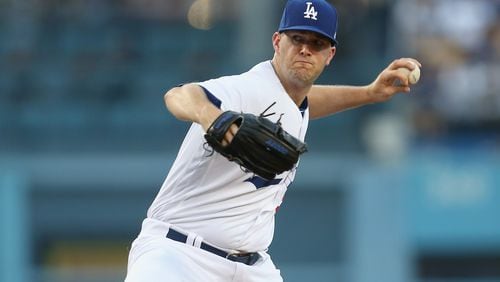 Ex-Brave Alex Wood of the Dodgers throws a pitch against the Giants at Dodger Stadium on July 28, 2017 in Los Angeles, California. (Photo by Stephen Dunn/Getty Images)