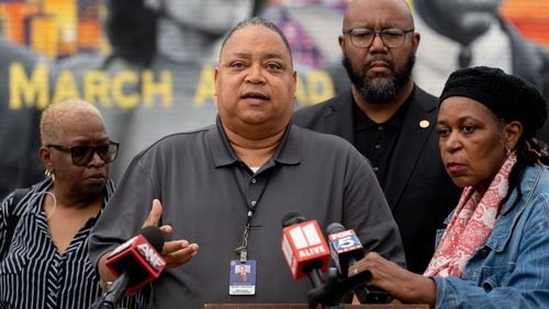 Atlanta city Councilman Michael Bond speaks to the media regarding recent violence in Vine City. Community members and city leaders gather to speak and demand action on gun violence in the Vine City area. Wednesday, April 10th, 2024 (Ben Hendren for the Atlanta Journal Constitution)