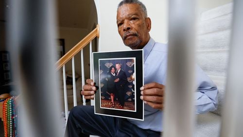 Joseph Larche holds a photograph posing with his late wife Diane Larche on Wednesday, May 15, 2024. Joseph experienced the death of two loved ones recently. His wife Diane Larche passed away on January 12, and two months later his daughter Stephanie died.
(Miguel Martinez / AJC)