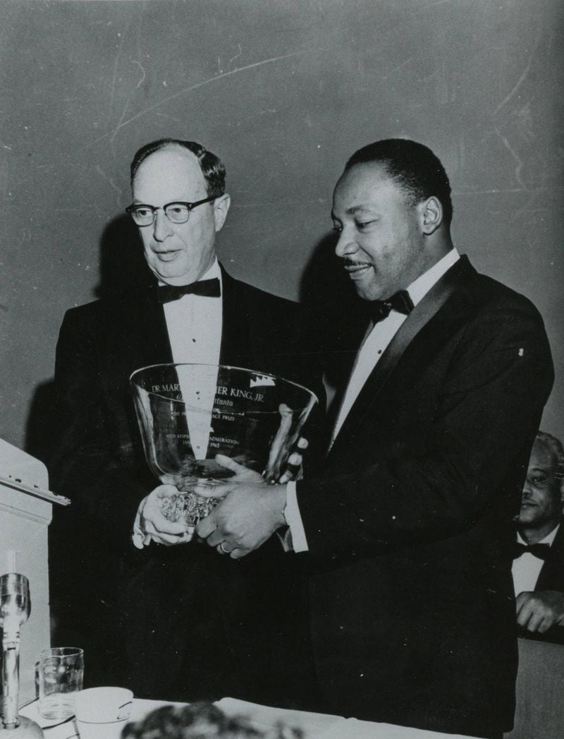 Martin Luther King, Jr., with Rabbi Jacob M. Rothschild, at a banquet held at Dinkler Plaza Hotel on January 27, 1965, honoring King for winning the Nobel Peace Prize. LOUIE FAVORITE / AJC FILE