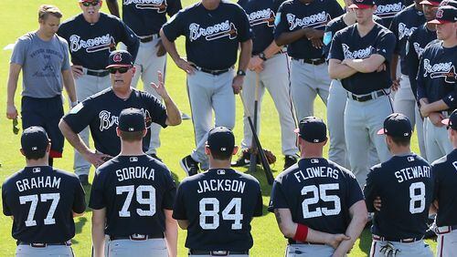 Braves manager Brian Snitker talks with his pitchers and catchers  Thursday, Feb 15, 2018, at the ESPN Wide World of Sports Complex in Lake Buena Vista, Fla.