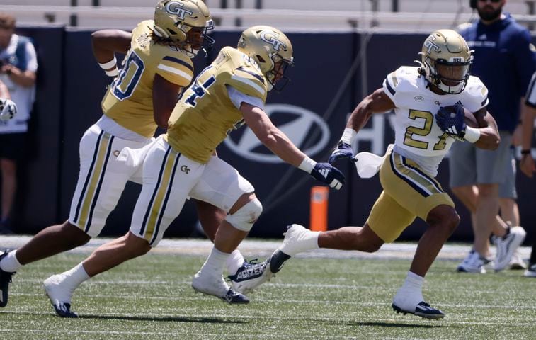 Georgia Tech running back Chad Alexander (27) outraces defenders during the Spring White and Gold game at Bobby Dodd Stadium at Hyundai Field In Atlanta on Saturday, April 13, 2024.   (Bob Andres for the Atlanta Journal Constitution)