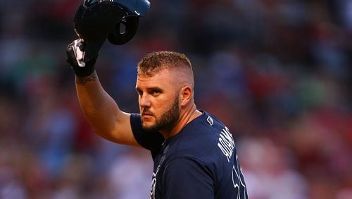 Matt Adams of the Atlanta Braves acknowledges the fans in the second inning during his first at bat against the Cardinals since being traded from the team at Busch Stadium on August 11, 2017 in St. Louis, Missouri.  (Photo by Dilip Vishwanat/Getty Images)