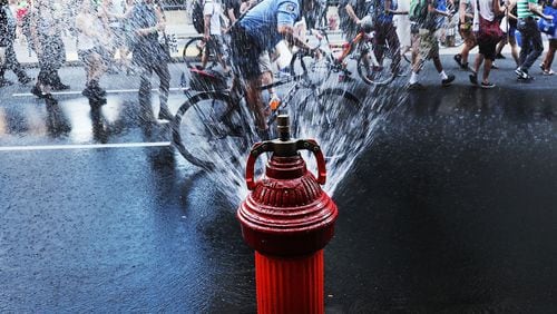 Atlanta-based Mueller Water Products, which makes fire hydrants and other water-handling parts, announced a restructuring that will cut 35 jobs. (Photo by Spencer Platt/Getty Images)
