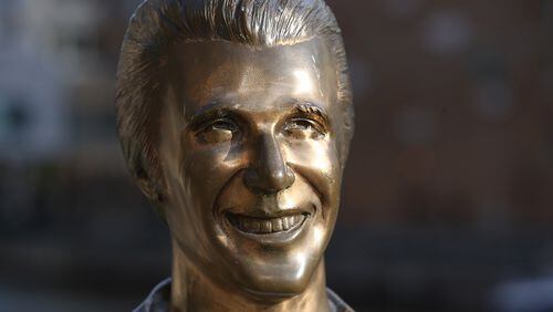 The Bronze Fonz, a public artwork by American artist Gerald Sawyer located on the Milwaukee Riverwalk, is the equivalent to the Big Chicken in Marietta seen on Tuesday, Jun 22, 2021, in Milwaukee. The Bronze Fonz depicts Henry Winkler as "The Fonz," a character in the 1970s television show Happy Days, which was set in Milwaukee.  Curtis Compton / Curtis.Compton@ajc.com