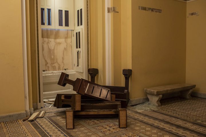 Destroyed cabinets that displayed books about women in politics at the Capitol in Washington on Thursday, Jan. 7, 2021, were destroyed during the riot on Wednesday. (Jason Andrew/The New York Times)