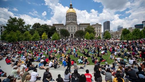 Hundreds of participants of the "OneRace Movement" listen to leaders inside Liberty Plaza, across the street form the Georgia State Capitol building, as they call for a biblical response of justice in Atlanta, Friday, June 19, 2020. The group marched from Centennial Olympic Park to the State Capitol building.