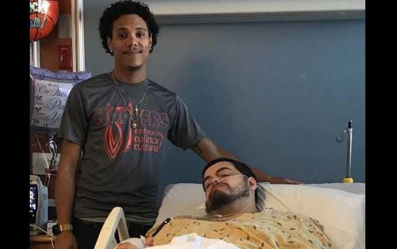 Jordan Williams, left, reunites with Timothy Anselmo, who Williams helped during the Jacksonville Landing shooting, during which Anselmo was shot three times. (Photo courtesy Timothy Anselmo)
