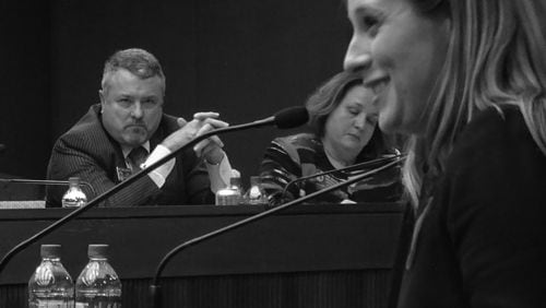 Law student Grace Starling takes the stand to testify against House Bill 51 as sponsor and longtime Cobb Rep. Earl Ehrhart watches. (Photo courtesy of Daniel Carter.)