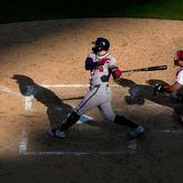 Atlanta Braves' Adam Duvall hits double two-run double off of Philadelphia Phillies' Jeff Hoffman during the seventh inning of an opening-day baseball game, Friday, March 29, 2024, in Philadelphia. (AP Photo/Matt Rourke)
