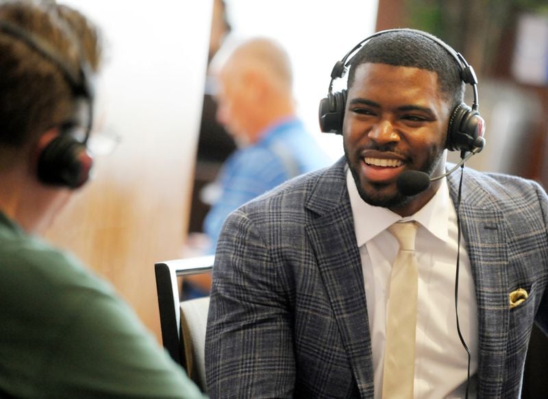 Georgia Tech's KeShun Freeman is interviewed on sports talk radio during the 2017 ACC Football Kickoff media event in Charlotte, N.C., Friday July 14, 2017. (Photo by Sara D. Davis, the ACC.com)