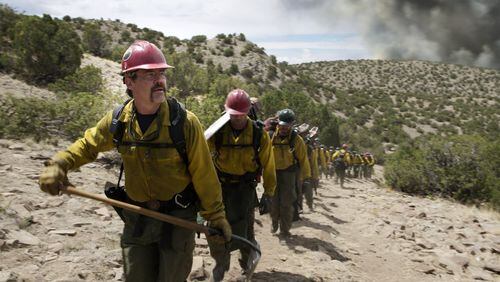 Josh Brolin, left, leads his team to fight fires in “Only the Brave.” Contributed by Richard Foreman Jr./Sony Pictures