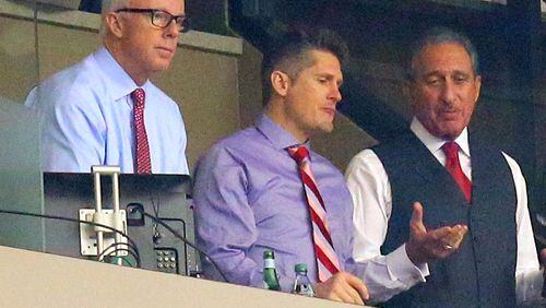 Falcons President Rich McKay (from left), General Manager Thomas Dimitroff and owner Arthur Blank watch the Falcons play the Buccaneers at the Georgia Dome in Atlanta in December. Curtis Compton, ccompton@ajc.com