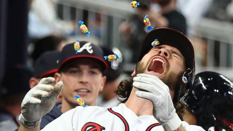 The Braves Charlie Culberson is greeted with a shower of bubble gum after his two-run homer against St. Louis on Wednesday. (Curtis Compton/Atlanta Journal-Constitution/TNS)