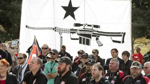 Gun rights activists listen during the Open Carry Texas "Carry to the Capitol" rally for HB 195, the open carry bill, at the Capitol on Monday January 26, 2015.