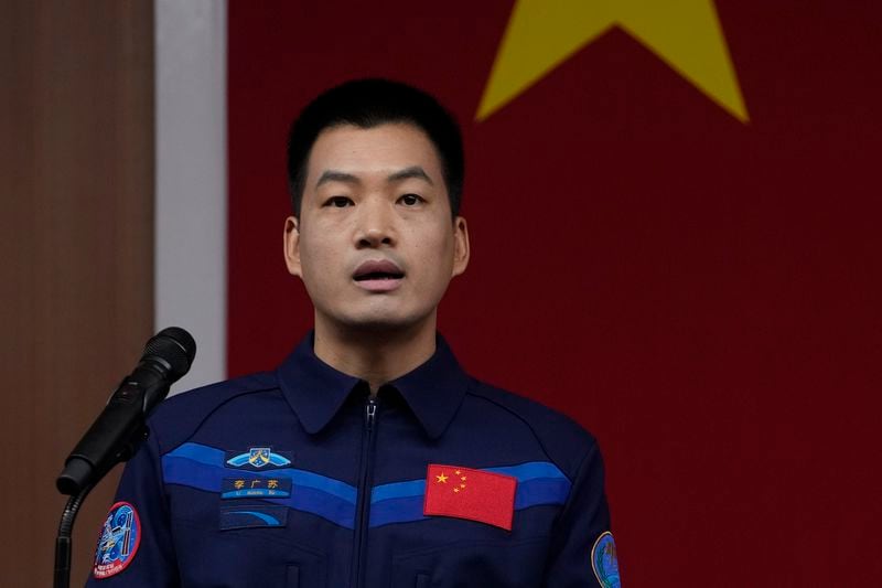 Chinese astronaut for the upcoming Shenzhou-18 mission Li Guangsu speaks during a meeting with media members at the Jiuquan Satellite Launch Center in northwest China, Wednesday, April 24, 2024. (AP Photo/Andy Wong)