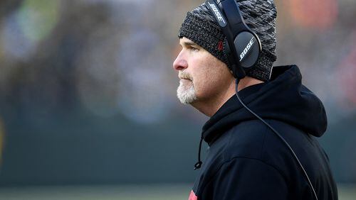 GREEN BAY, WISCONSIN - DECEMBER 09: Head coach Dan Quinn of the Atlanta Falcons watches from the sideline during the second half of a game against the Green Bay Packers at Lambeau Field on December 09, 2018 in Green Bay, Wisconsin. (Photo by Stacy Revere/Getty Images)