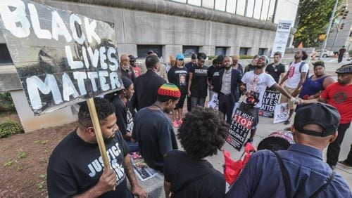 A 24-hour protest at the Fulton County Justice Center at 395 Pryor St SW, in last summer in Atlanta was aimed at bringing attention to the number of black men killed by police. JOHN SPINK /JSPINK@AJC.COM