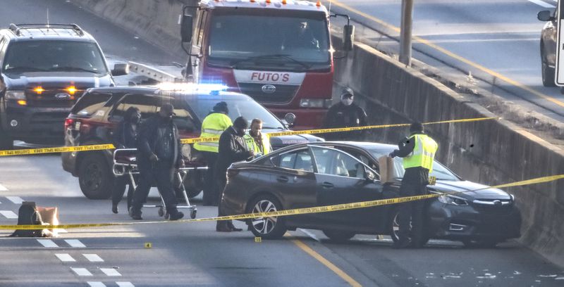 A double shooting in the southbound lanes of I-85 in Midtown Atlanta left one man dead and wreaked havoc on the commute on Feb, 10, 2021. (JOHN SPINK / John.Spink@ajc.com)


