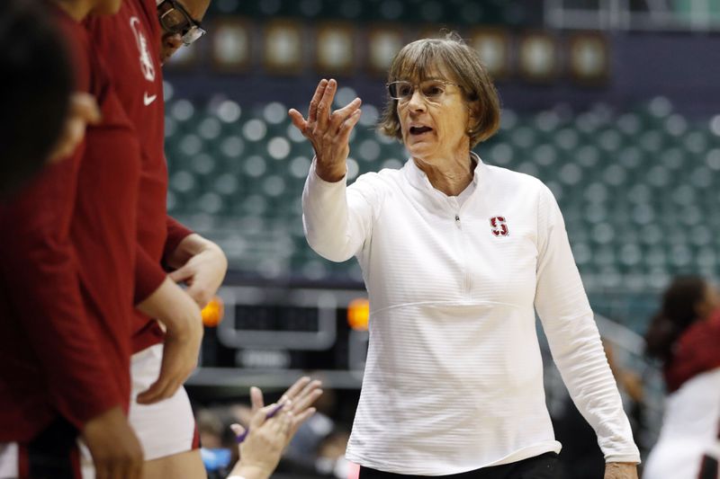 FILE - Stanford head coach Tara VanDerveer gestures towards her bench during the first quarter of an NCAA college basketball game against Grambling State, Saturday, Nov. 26, 2022, in Honolulu. VanDerveer, the winningest basketball coach in NCAA history, announced her retirement Tuesday night, April 9, 2024, after 38 seasons leading the Stanford women’s team and 45 years overall. (AP Photo/Marco Garcia)