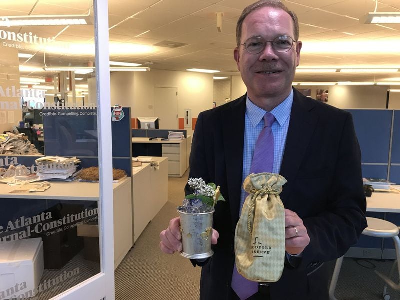 During a recent visit to the AJC, Chris Morris, master distiller at Woodford Reserve, demonstrated a new recipe for a mint julep flavored with a British accent. BO EMERSON / BEMERSON@AJC.COM