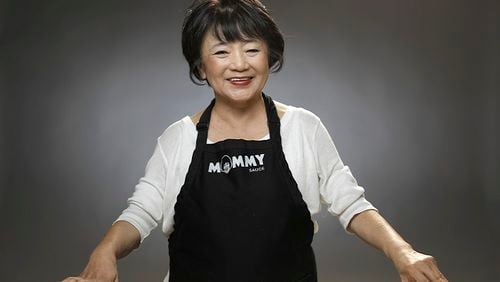 Jai Nam "Mommy Choi" Choi, makes a traditional spicy Korean rice cake dish -- dduk-bok-gi -- usually made during the holidays. (Myung J. Chun/Los Angeles Times/TNS)