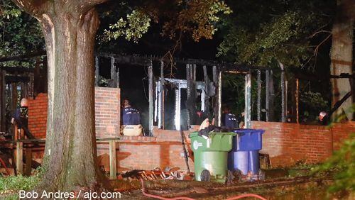 Atlanta fire crews work an early Friday morning fatal house fire on Pegg Road in southwest Atlanta.