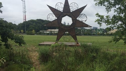 One of the most popular pieces in an earlier version of Art on the Atlanta Beltline, this is “A 24/7 Timestar Lives,” by Charles Smith, installed by the skatepark on the Atlanta Beltline’s Eastside Trail. AJC photo by Jill Vejnoska