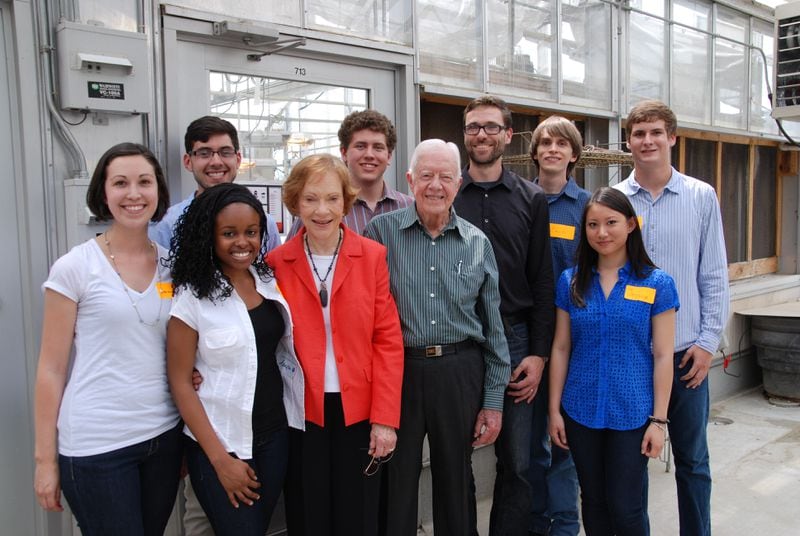 Former first lady Rosalynn and President Jimmy Carter visit Professor Jacobus (Jaap) de Roode and students at his greenhouse at Emory University. photo credit: Malia Escobar.