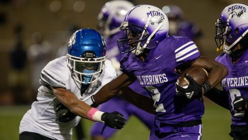 Miller Grove's Cayman Spalding (2) carries the ball during a GHSA high school football game between Stephenson High School and Miller Grove High School at James R. Hallford Stadium in Clarkston, GA., on Friday, Oct. 8, 2021. (Photo/Jenn Finch)