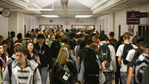 The Cherokee County School Board has scheduled a public hearing to take comments on solutions to overcrowding at Cherokee High School. AJC FILE