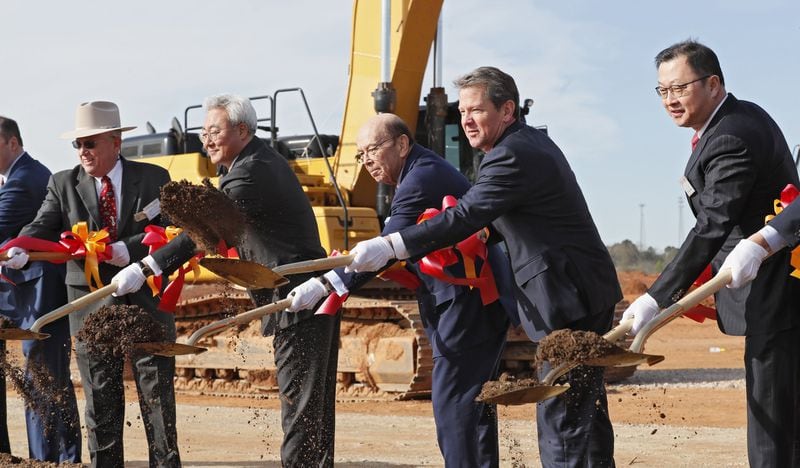 Kim Jun (from left), SK Innovation CEO, U.S. Secretary of Commerce Wilbur Ross, Gov. Brian Kemp, and Chey Jae won, SK Executive Vice Chairman, joined in a groundbreaking ceremony on March 19, 2019. A South Korean automotive battery maker broke ground in March on a new nearly $1.7 billion battery plant in Jackson County. (Bob Andres/AJC)