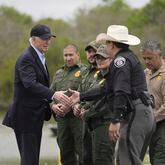 FILE - President Joe Biden talks with the U.S. Border Patrol and local officials, as he looks over the southern border, Feb. 29, 2024, in Brownsville, Texas, along the Rio Grande. (AP Photo/Evan Vucci, File)