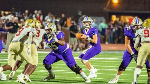 The Cartersville Purple Hurricanes, led by quarterback Jake Parker, are Class 5A's No. 1 ranked team with a 7-0 record. Last year they reached the 5A championship. (Nick Johnson/Special)