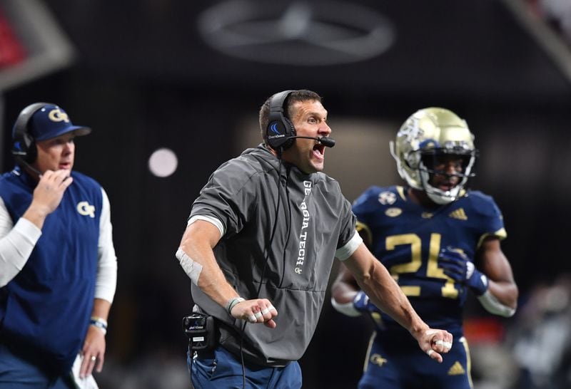 Tech assistant Andrew Thacker reacts during the second half of an NCAA college football game at Mercedes-Benz Stadium in Atlanta on Saturday, September 25, 2021. Georgia Tech won 45-22 over North Carolina. (Hyosub Shin / Hyosub.Shin@ajc.com)
