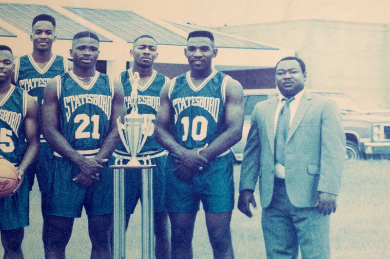 Coach Lee Hill, seen at right with the Statesboro High School’s 1991 State Championship team, won 877 games in his career before his death in August 2020. “He was the one person I would say embodied the spirit of Statesboro,” said Mayor Jonathan McCollar. “So when he passed, we truly lost an institution.” (AJC Photo/Stephen B. Morton)