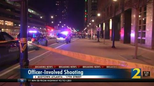 The GBI is investigating after a Georgia State University off-duty officer shot a man Sunday night who was firing into a crowd at Atlantic Station.