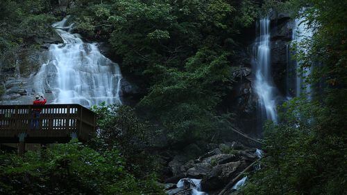 A visitor takes in spectacular Anna Ruby Falls in the heart of the Chattahoochee National Forest.