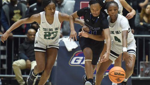 Westlake's Camerah Langston (31) fights for a loose ball with Collins Hill's Jailah Clark-Jones (23) and Collins Hill's Asjah Inniss (4) during 2020 GHSA State Basketball Class Championship game at the Macon Centreplex in Macon on Saturday, March 7, 2020. Westlake won 72-53 over Collins Hill. (Hyosub Shin / Hyosub.Shin@ajc.com)