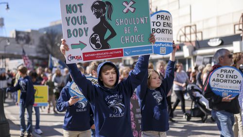 Students with Perimeter School participate in an Anti-Abortion march, Friday, Jan. 20, 2023, in Atlanta. This is the first time the Anti-Abortion advocates hold a rally since the Roe V. Wade was overturned. Jason Getz / Jason.Getz@ajc.com)

