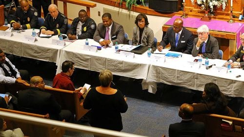 Fulton County Juvenile Court Chief Judge Bradley Boyd (second from right) is pictured with other local judicial and law enforcement officials in 2014 at a Crime & Safety Summit at Cascade United Methodist Church. CURTIS COMPTON / CCOMPTON@AJC.COM
