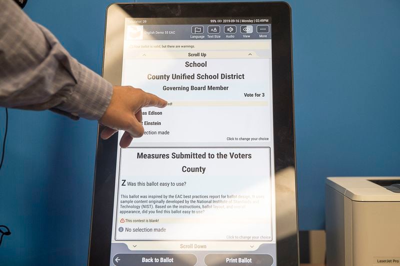 09/16/2019 -- Atlanta, Georgia -- The new Georgia voting machine at the James H. "Sloppy" Floyd building in Atlanta, Monday, September 16, 2019. A 21.5-inch touchscreen displays a ballot that voters can use to make their choices for candidates. The touchscreen, called a ballot marking device, includes accessibility options such as enlarged text and a brail touchpad. (Alyssa Pointer/alyssa.pointer@ajc.com)