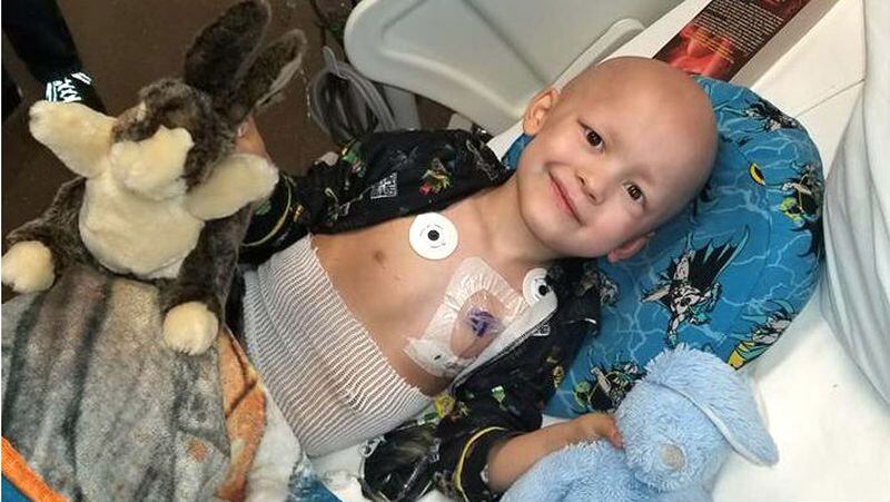 Garrett Matthias, 5, of Van Meter, Iowa, wrote his own obituary before he died July 6, 2018, of alveolar fusion negative rhabdomyosarcoma. The rare cancer, with which he was diagnosed in September, started in his temporal bone, his cranial nerve and his inner ear. Garrett loved superheroes, especially Batman, and wanted a Thor-inspired goodbye at his funeral, along with snow cones and a bouncy house for every year that he lived. His parents, Emilie and Ryan Matthias, are making his wishes happen at his memorial service Saturday.