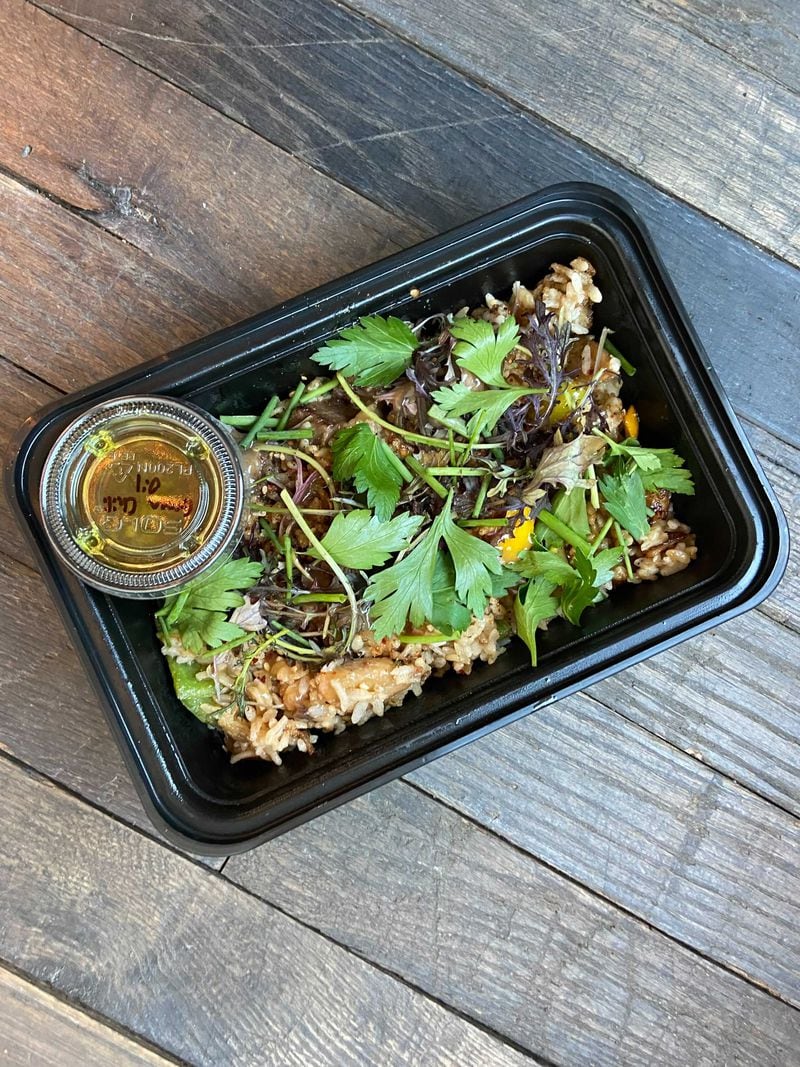 Little Bear's highly transportable beef fried rice holds the flavors of black garlic sauce, green chili oil, South American fruit feijoa, scallion, peppers and herbs. Courtesy of Little Bear