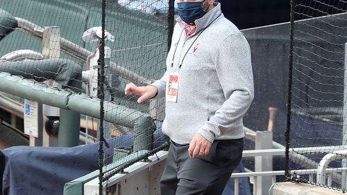 Braves general manager Alex Anthopoulos wears a mask as he enters the field at Truist Park before the team plays the Tampa Bay Rays on Thursday, July 30, 2020 in Atlanta.    Curtis Compton ccompton@ajc.com