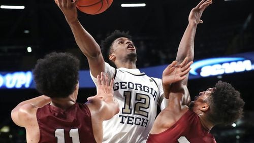 Georgia Tech forward Khalid Moore is fouled by Morehouse forward Kairo Whitfield (right) on a double team with guard Michael Olmert (left) during the first half in a NCAA college basketball game on Tuesday, January 28, 2020, in Atlanta.   Curtis Compton ccompton@ajc.com