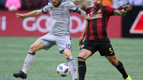 Atlanta United defender Leandro Gonzalez Pirez battles Chicago Fire forward Aleksander Katai for the ball during the first half in a MLS soccer match on Sunday, Oct 21, 2018, in Atlanta.   Curtis Compton/ccompton@ajc.com