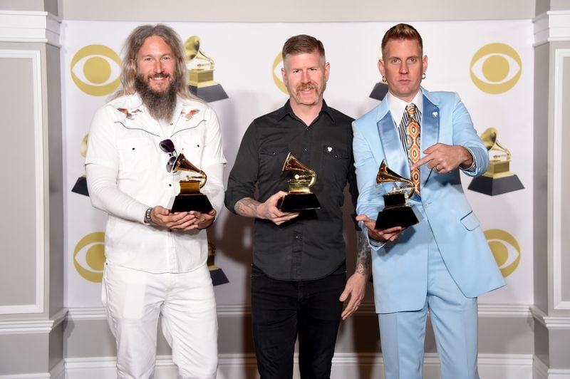  Troy Sanders, Bill Kelliher and Brann Dailor of Mastodon won their first Grammy in January 2018. (Photo by Michael Loccisano/Getty Images for NARAS)
